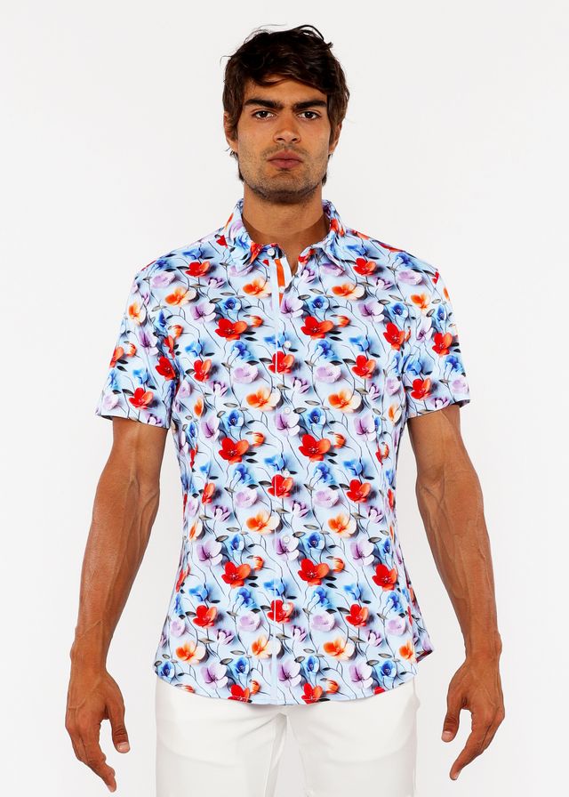 A floral 3d print stretch knit shirt in white with vibrant red blue and pink blossoms and short sleeves