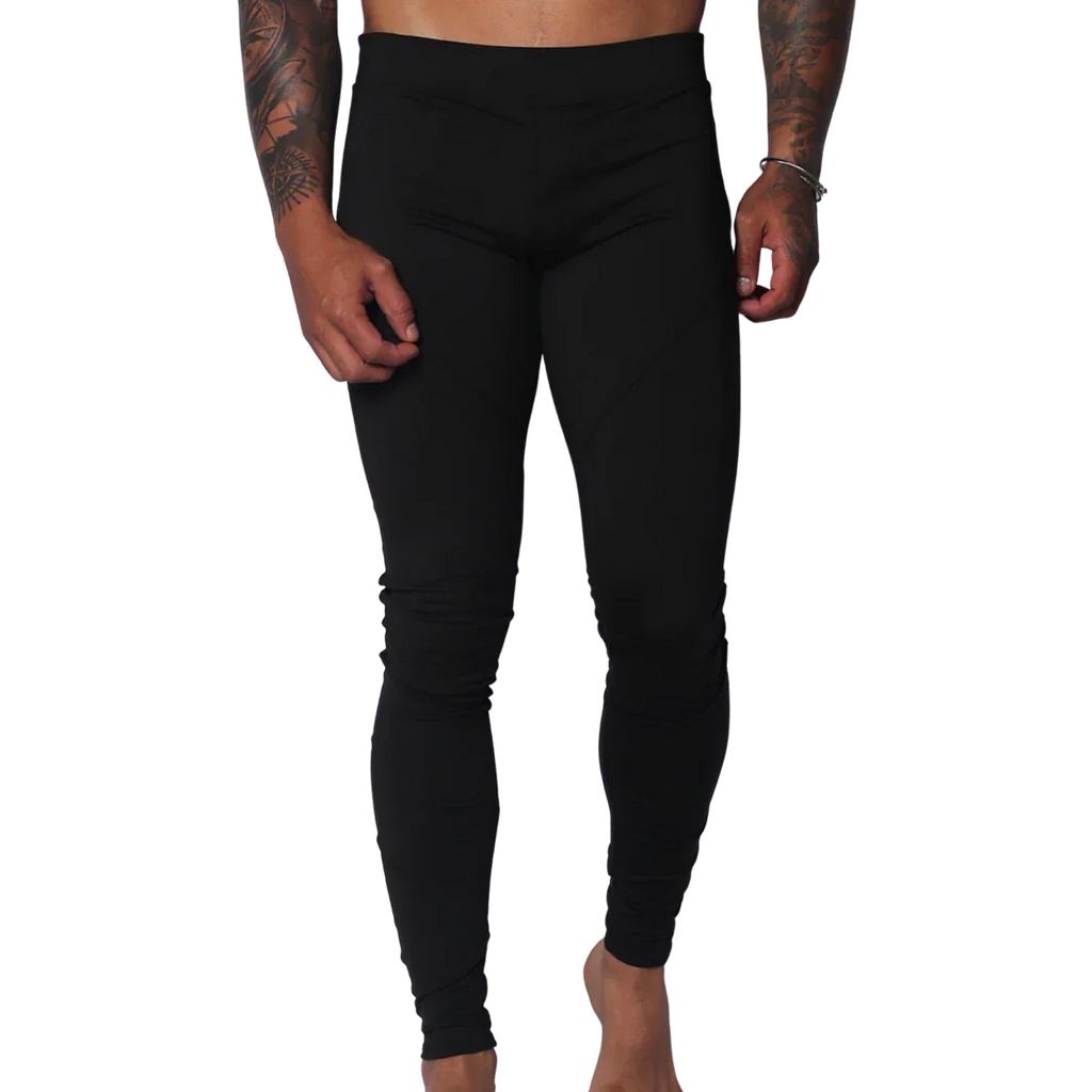 Form-fitting black Lycra leggings featuring a high-rise elastic waistband and a sleek, minimalist design.
