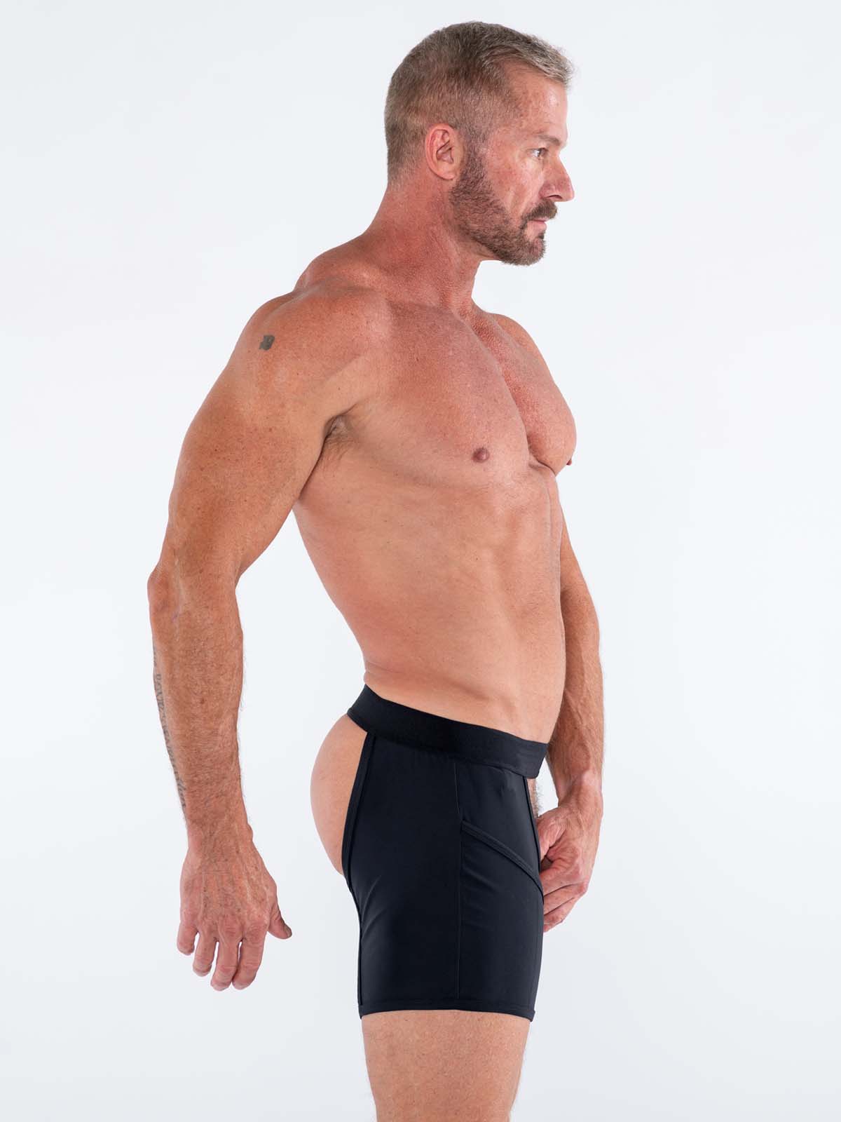 Black high-waisted sleek form-fitting athletic shorts designed for performance by Fk Sport Cache Chaps
