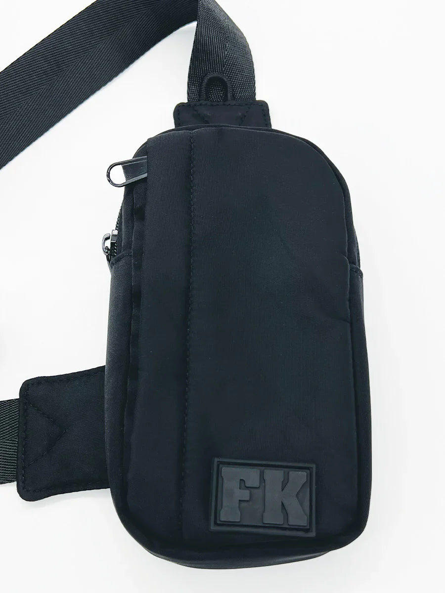 Black fk brand fk sport crossbody bag with sleek minimalist design and durable fabric for everyday use