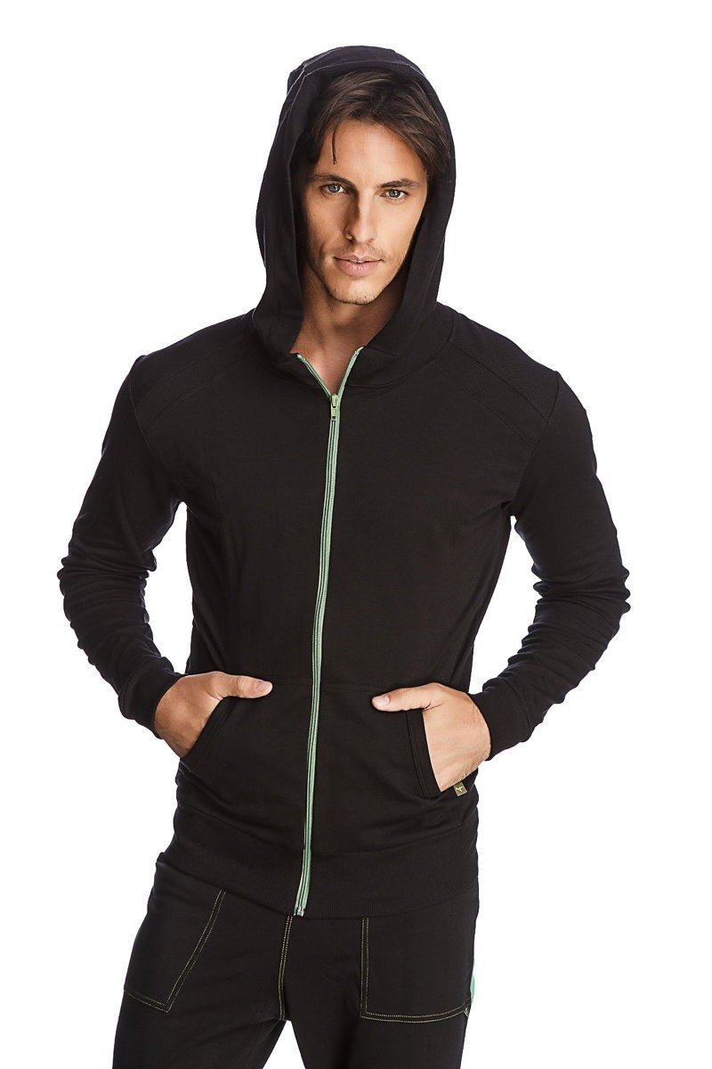 Black form-fit crossover yoga track performance hoodie with green zipper pull and matching seam stitching