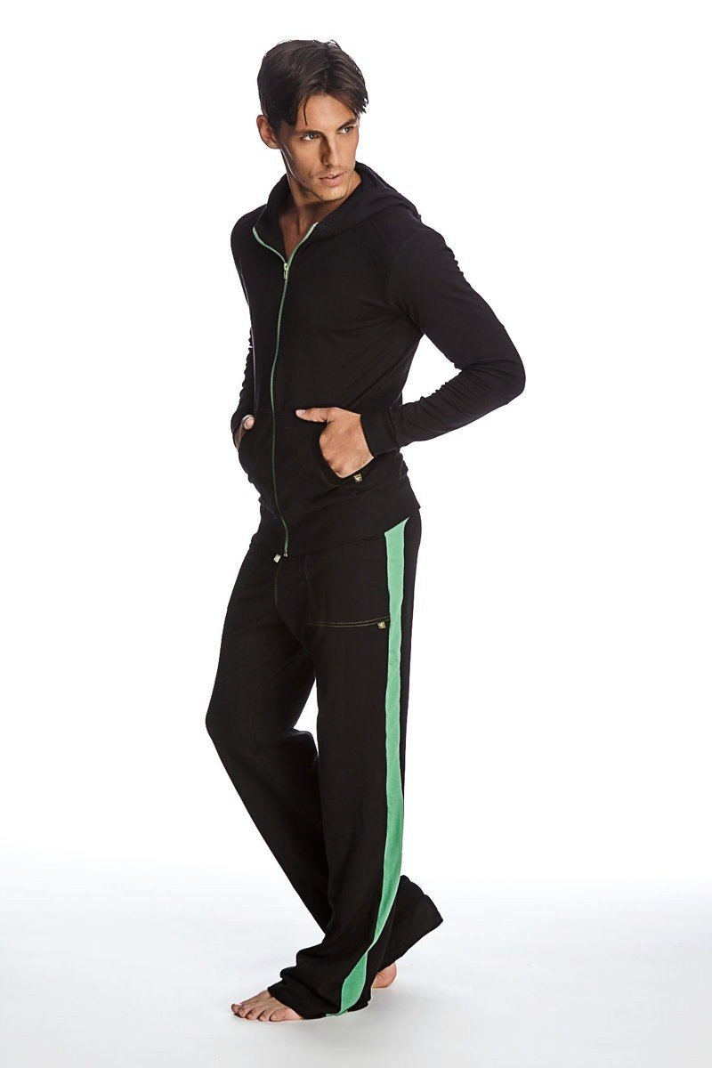 Form-fit crossover yoga track performance black hoodie and pants set with vibrant green stripe for activewear use