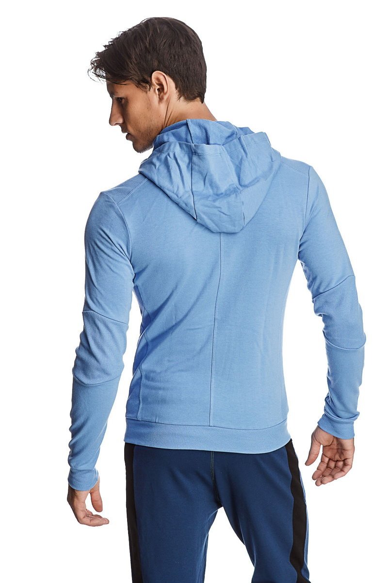Light blue form-fit crossover yoga track performance hoodie with long sleeves and a sleek athletic cut
