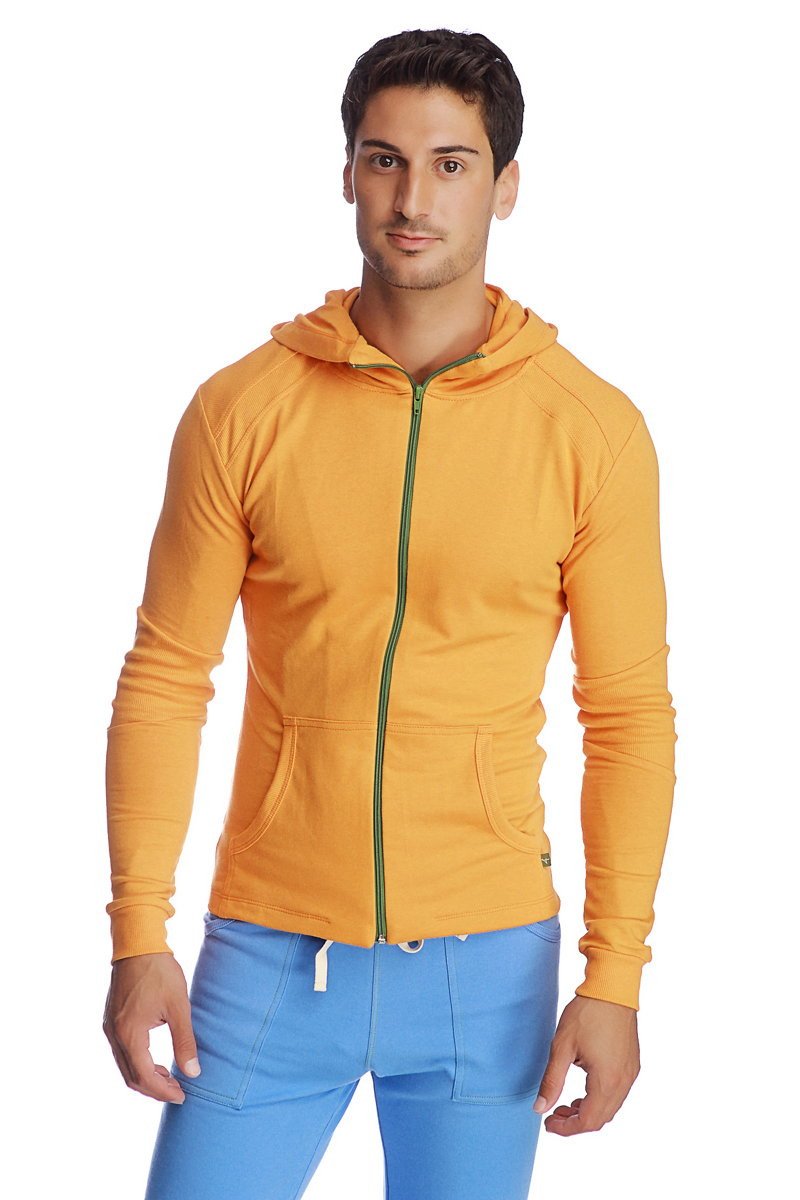 Form-fit crossover yoga track performance hoodie in sun orange with green zipper and front pockets for active wear