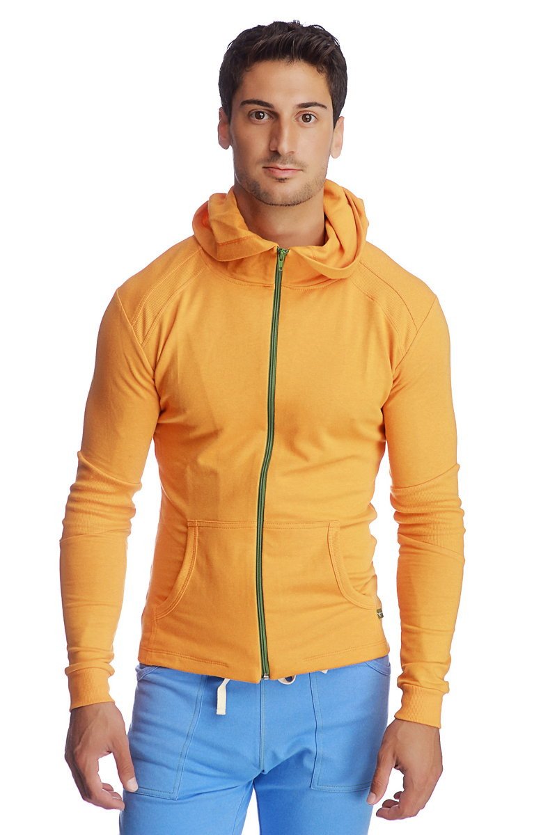 A vibrant orange form-fit crossover yoga track performance hoodie with green zipper and two front pockets