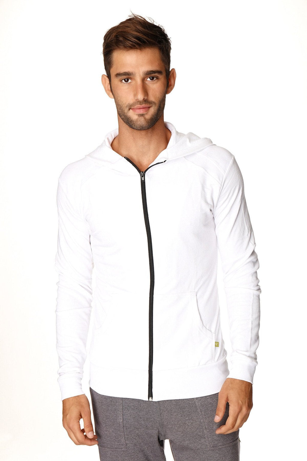 Form-fit crossover yoga track performance hoodie in white with black zipper and subtle side pockets for active wear
