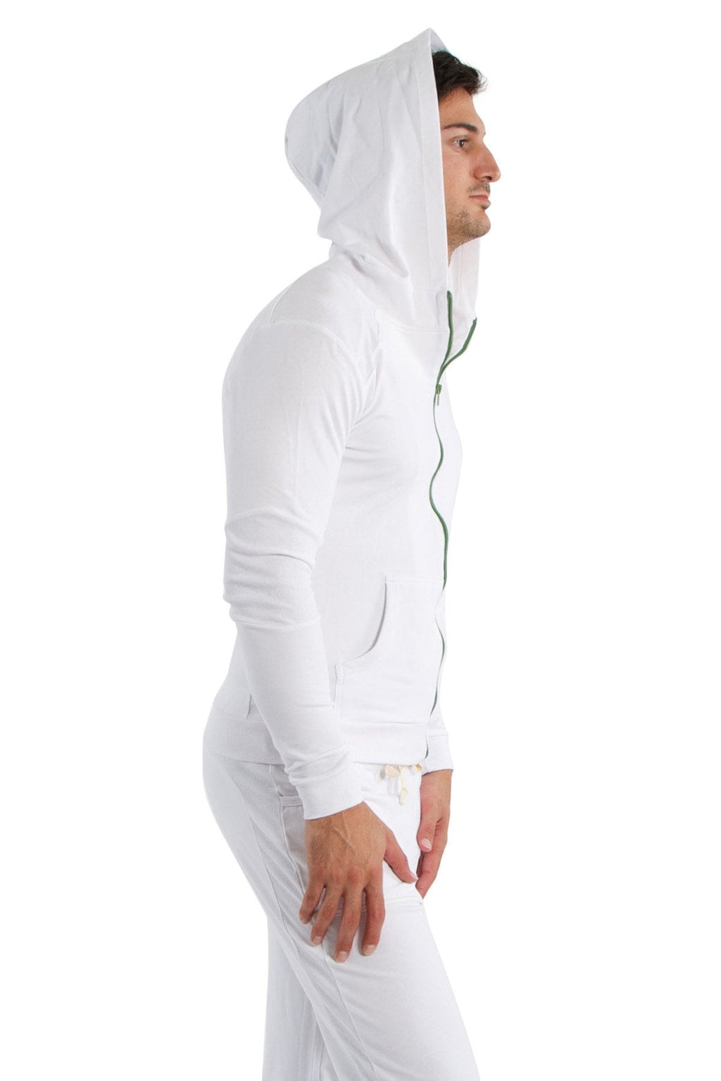 White form-fit crossover yoga track performance hoodie with hood and green zipper trim for activewear