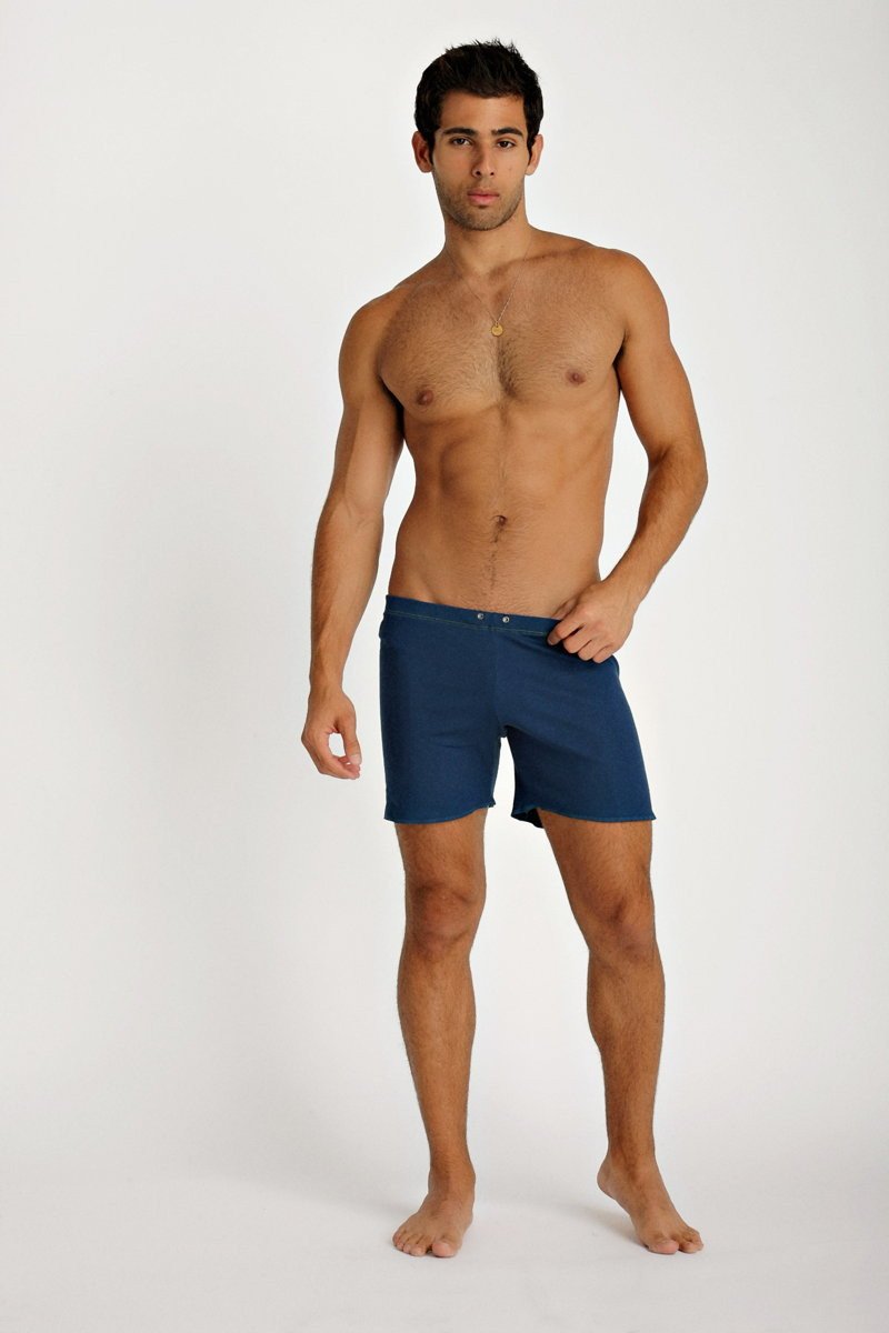 Navy blue fusion yoga shorts with a clean design and button closure at the waist for comfortable activewear