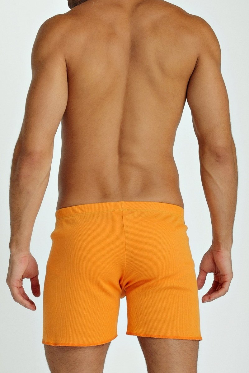 Orange ribbed fusion yoga short swim trunks made from lightweight fabric designed for active water use