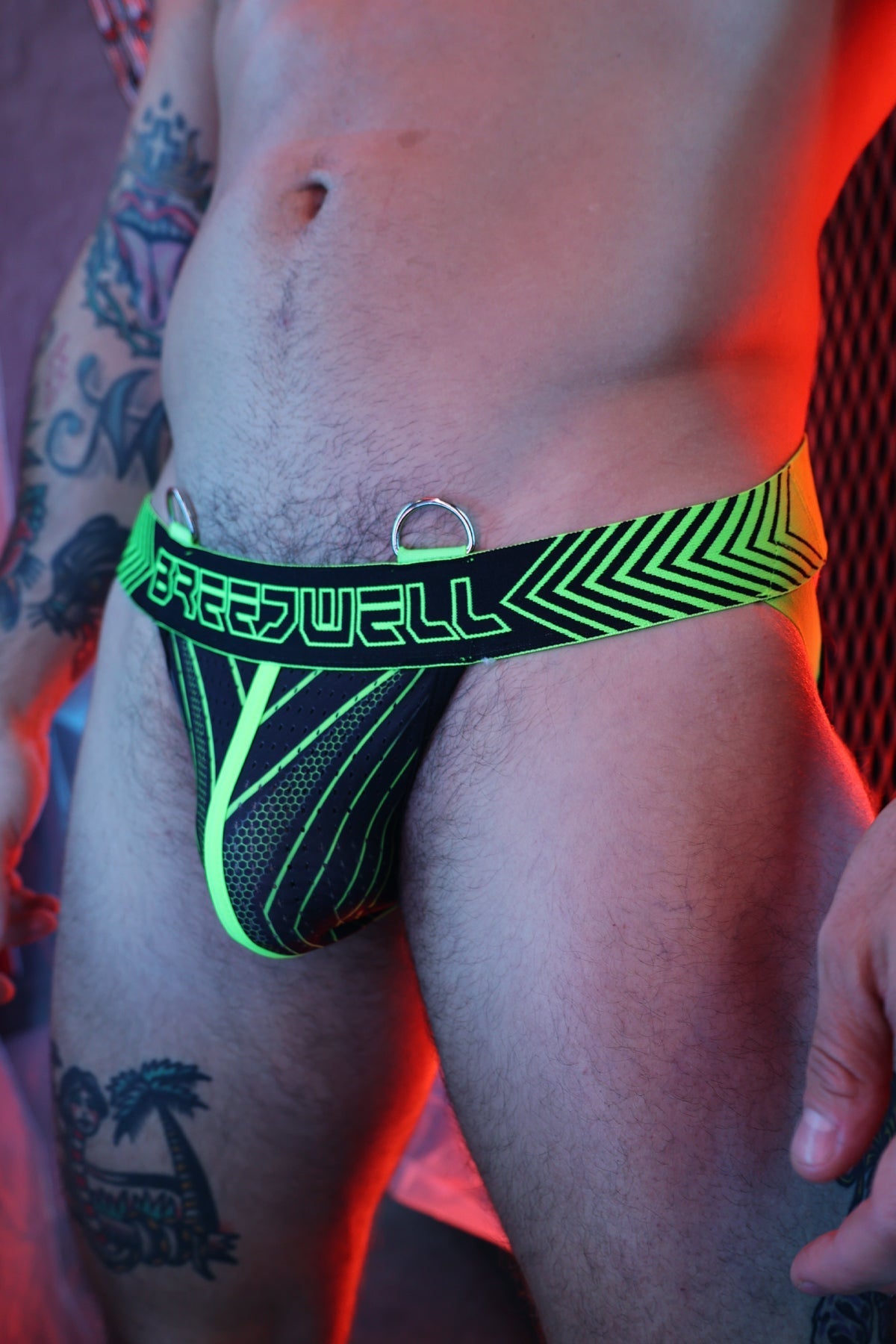 Men’s neon green and black patterned briefs with brejwell logo waistband in futura jock style