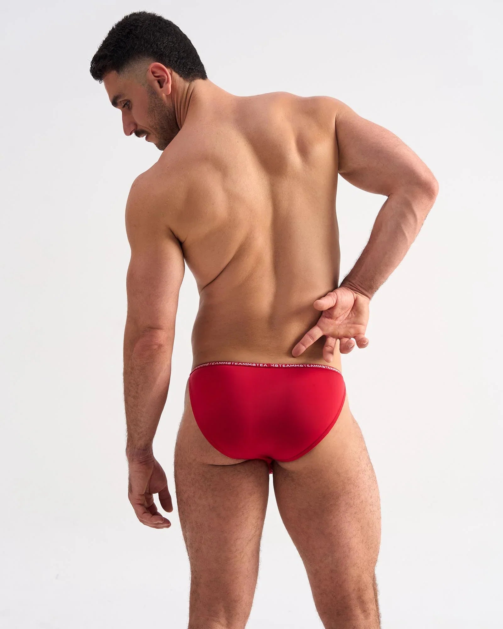 Red glide micro brief with subtle elastic waistband made from smooth microfiber for comfortable everyday wear