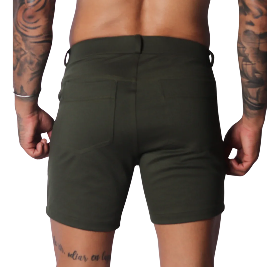 Form-fitting Sunday green short in a smooth, matte fabric with two back pockets and a clean, minimalist design.
