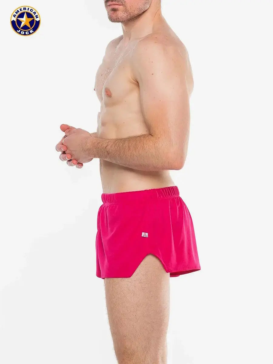 Men's running shorts in paradise pink made by AMERICAN JOCK featuring a comfortable elastic waistband and a lightweight design.