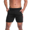 Gigo energetic black athletic shorts with a red side stripe and small circular logo on the thigh