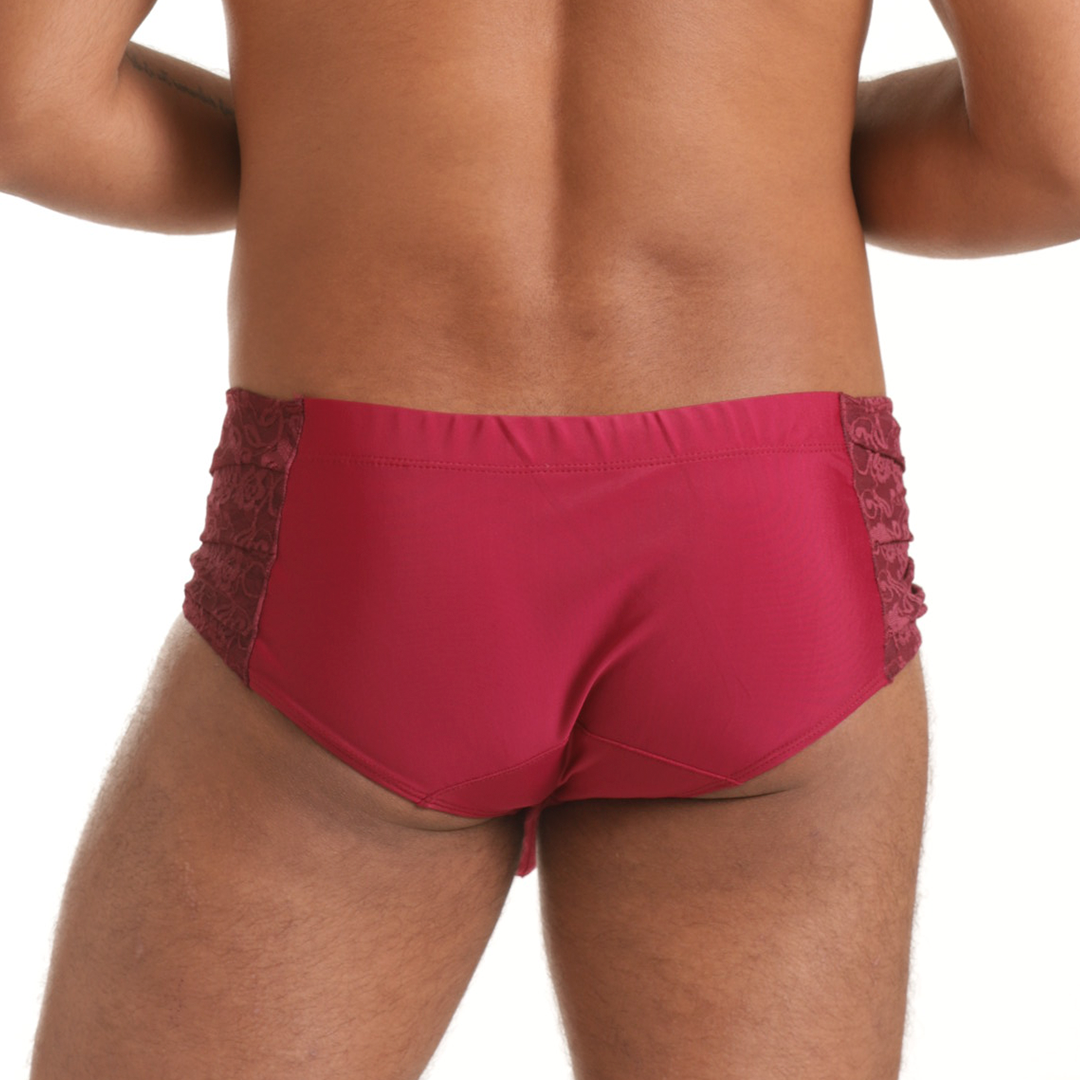 Red lace-trimmed briefs in satin-like fabric designed as gigo hindu wine swim brief for stylish swimwear use