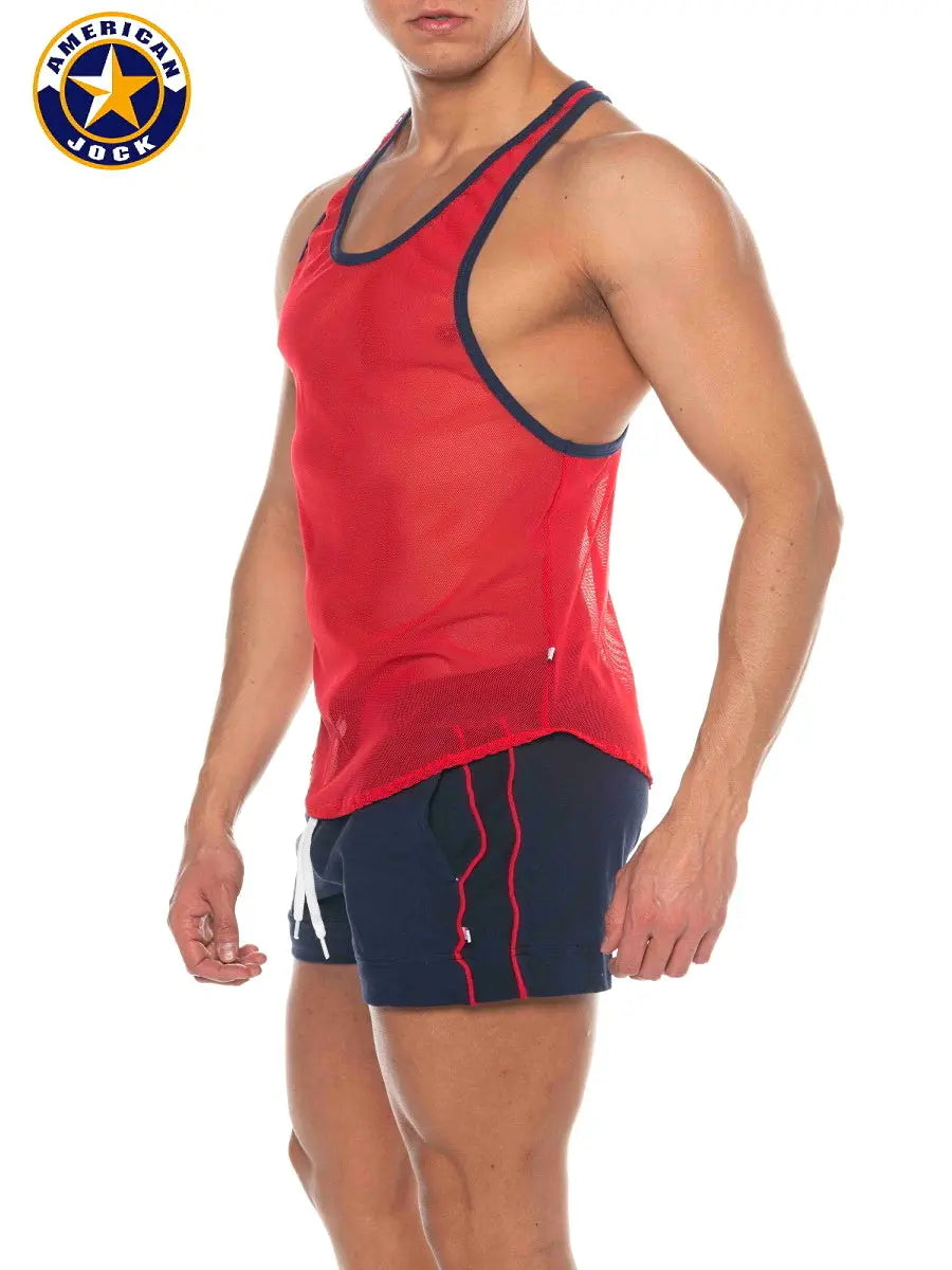 Red mesh tank top with navy trim worn by a model featuring a sleeveless design by AMERICAN JOCK.