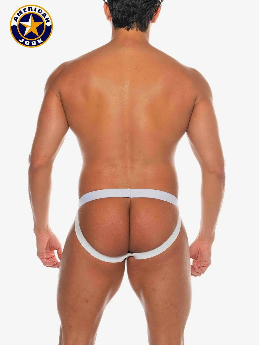 Black and white men's jockstrap by AMERICAN JOCK featuring a suspensory design and elastic waistband shown on a model from the back.