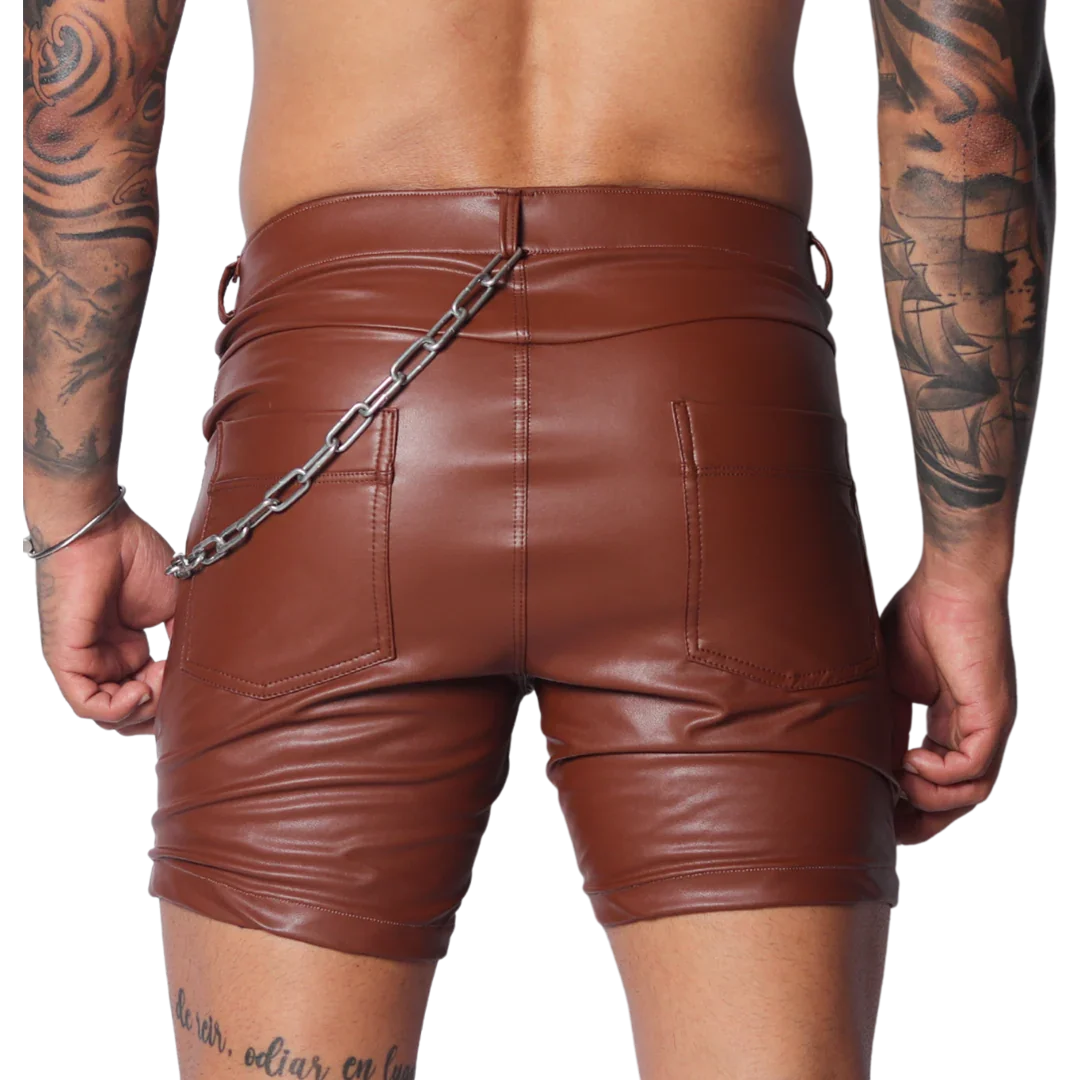 Brown faux leather fitted shorts featuring a back silver chain accent, dual pockets, and a classic five-pocket design.