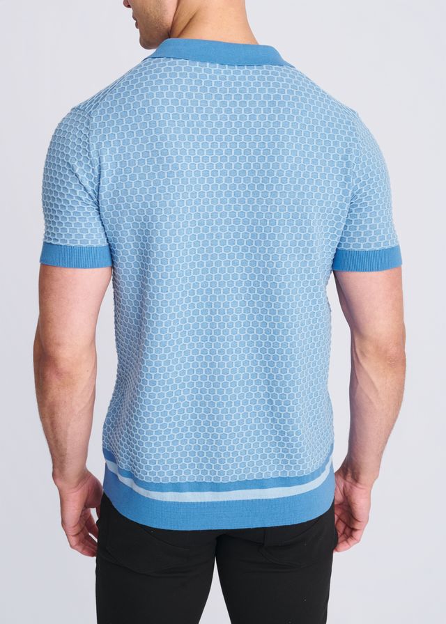 Light blue short-sleeved honeycomb textured knit polo shirt with subtle hexagonal pattern ribbed trim and button front