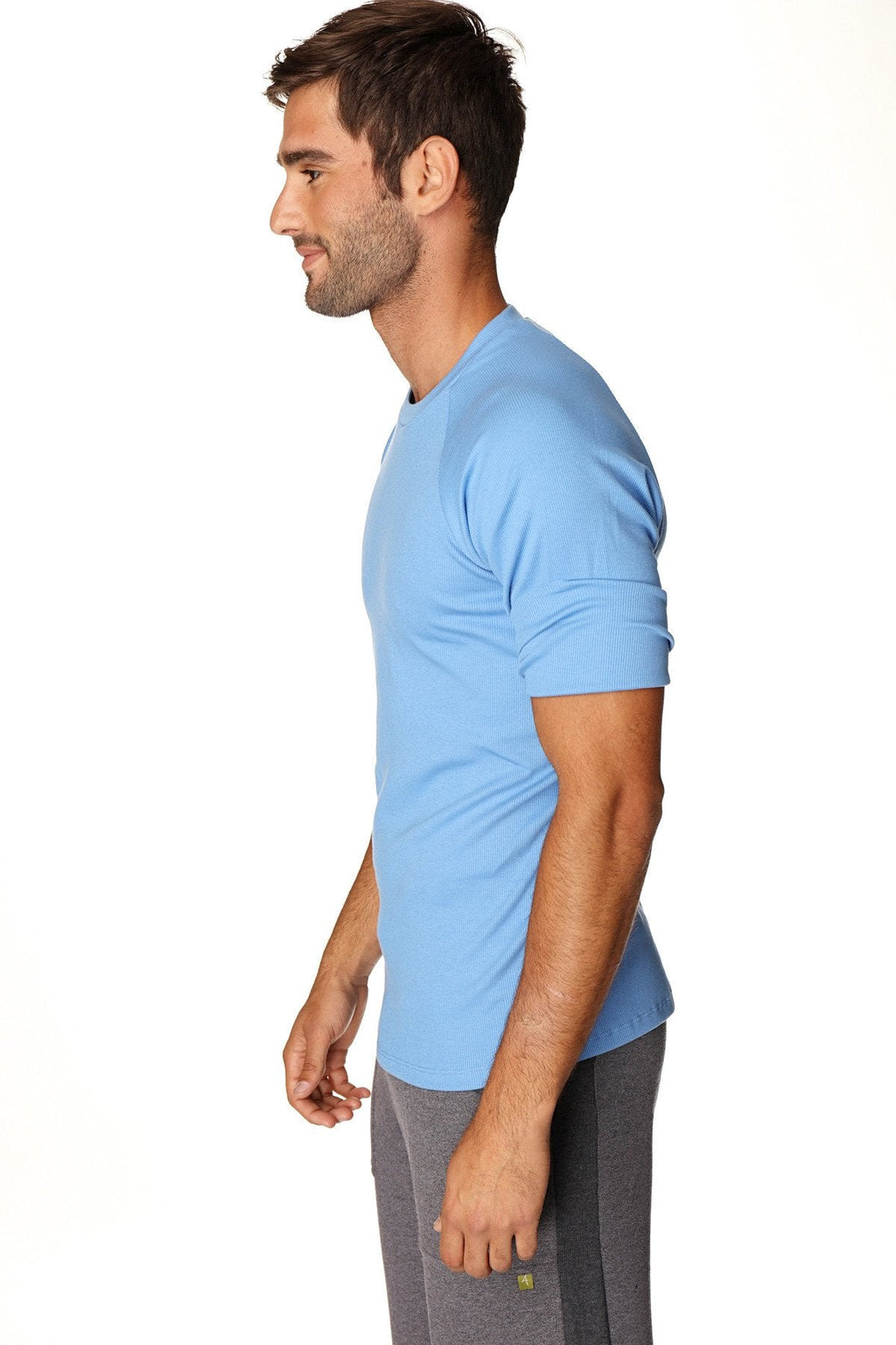 Hybrid crew neck raglan tee in ice blue with short sleeves and subtle ribbed cuff detailing for athletic wear
