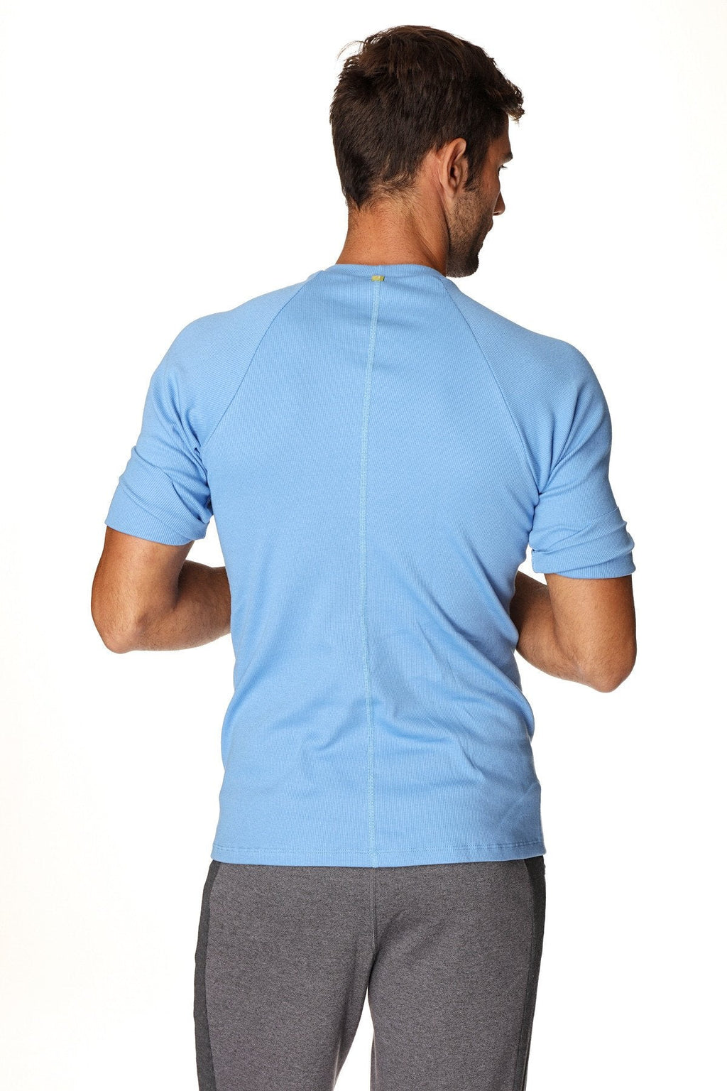 Light blue hybrid crew neck raglan tee with short sleeves and subtle vertical back seam shown from back side
