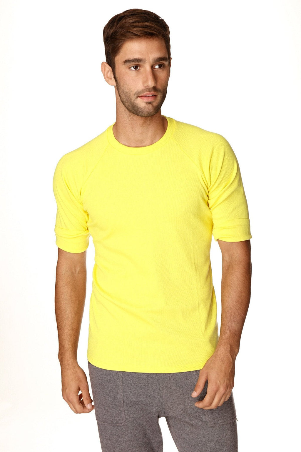 Bright yellow short-sleeved hybrid crew neck raglan tee made from soft breathable fabric for casual wear