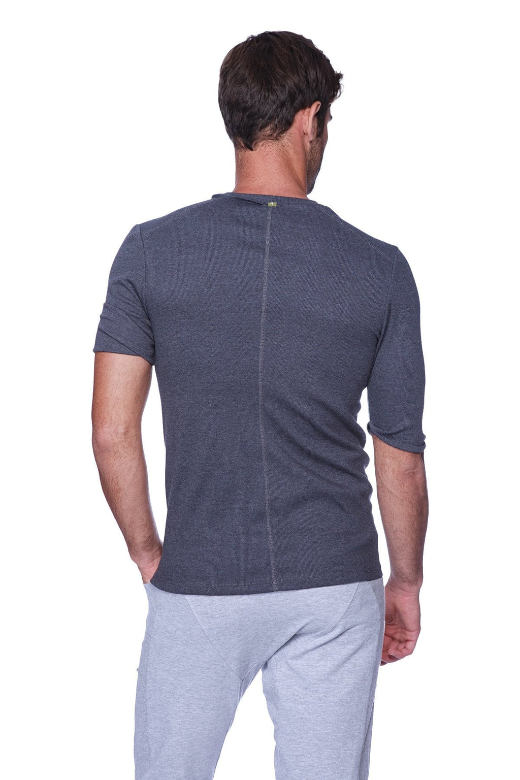 Dark gray textured hybrid v-neck short sleeve t-shirt with subtle vertical seam on the back in charcoal color