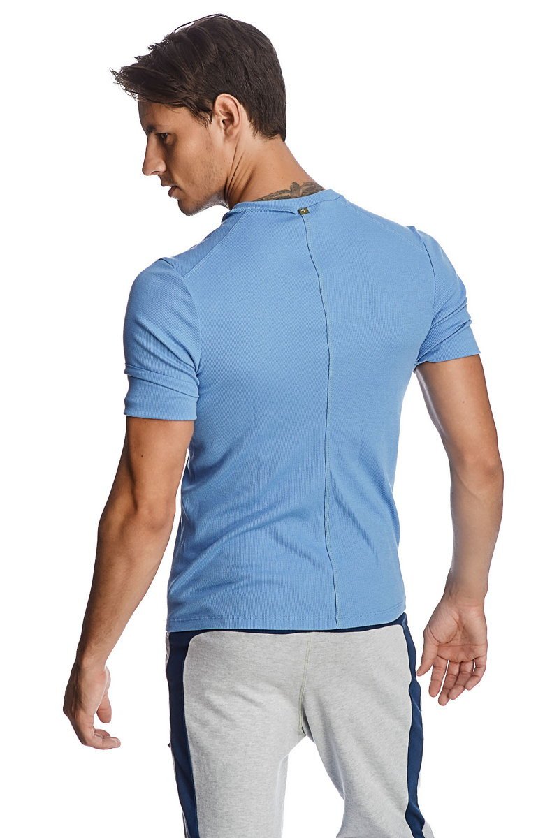 Light blue hybrid v-neck athletic shirt with ribbed texture and central back zipper shown from the back side