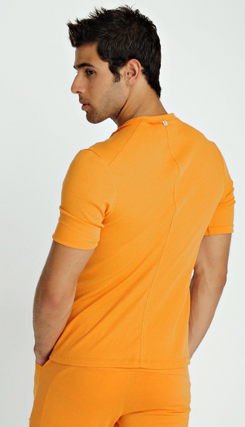Bright orange short-sleeved athletic top hybrid v-neck with sleek form-fitting design for active wear