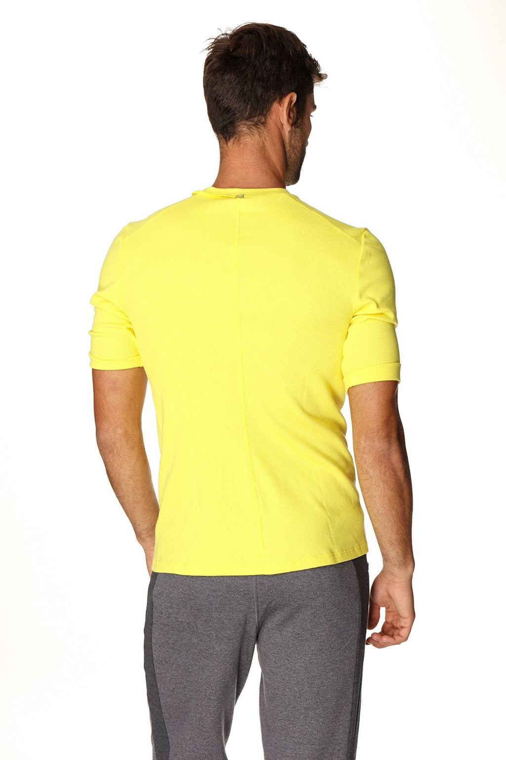 Bright yellow short-sleeved hybrid v-neck t-shirt with a simple crew neck design for casual wear
