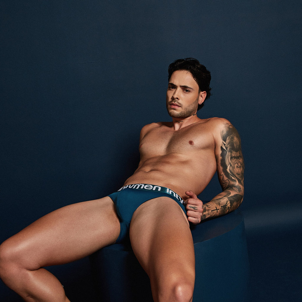 Men’s teal intymen ine034 jockstrap briefs with white men logo on waistband for support and comfort