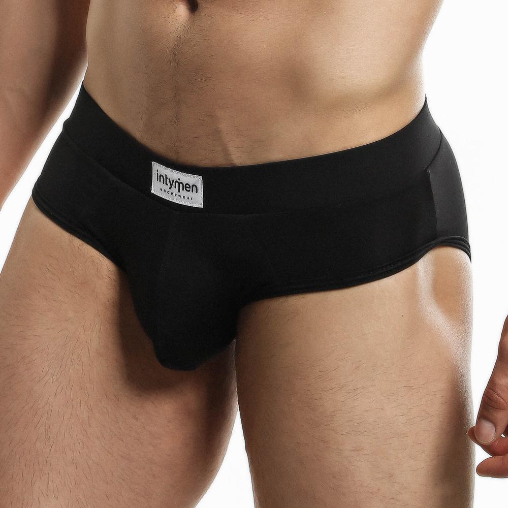 Intymen inj062 black men’s briefs with a snug fit and white label on the waistband in soft breathable fabric
