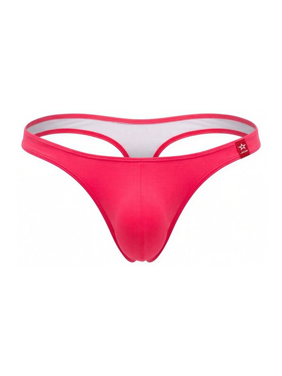 Bright pink form-fitting jor 2389 travel swim thong with white lining and red brand tag in candy color