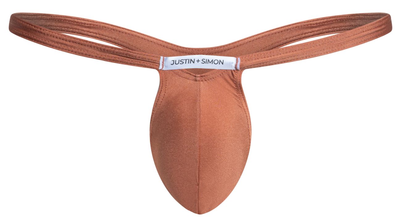A rust-colored ochre seamless thong made of soft fabric with a justin + simon branded label at the center