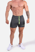 Dark gray heather jed north agile bodybuilding 4 inch shorts with neon green drawstrings and zipper pockets