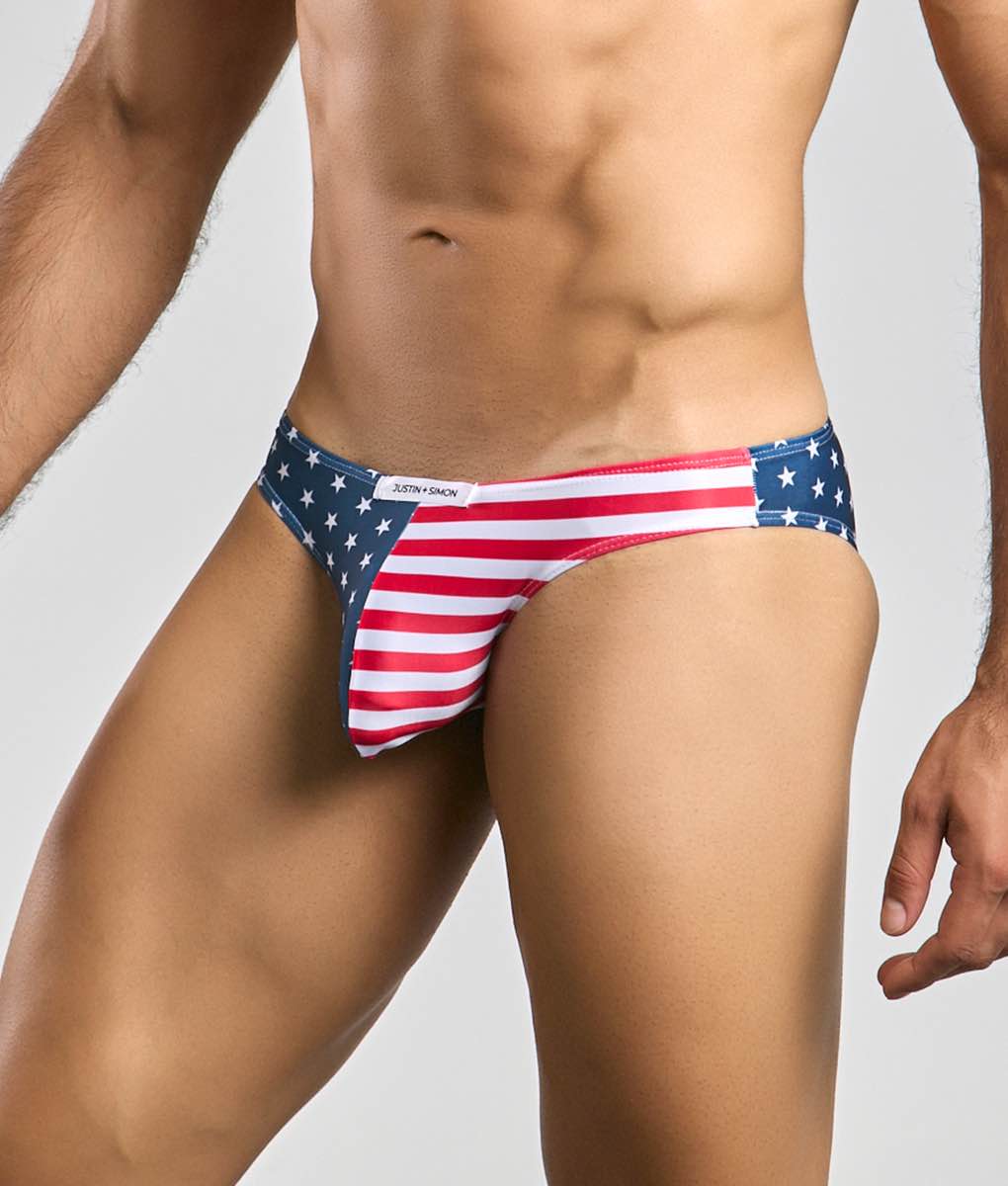 Justin + Simon classic mens bikini briefs in red white and blue american flag pattern with glossy fabric finish