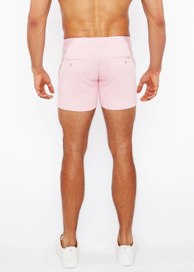 Pink linen-look textured tailored men’s shorts with two back zip pockets shown from the back side