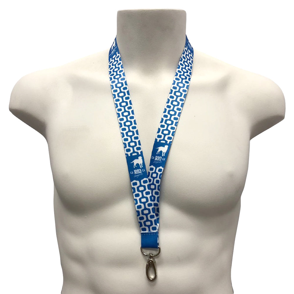 Blue logotipo lanyard with white geometric pattern and cia rio ca logo featuring silver metal clasp for key holding