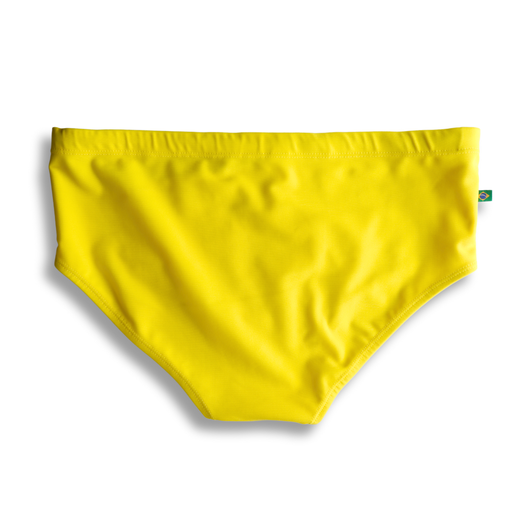 Lemonade yellow solid men’s swimming sunga in bright yellow smooth stretchy fabric with a brazilian flag tag