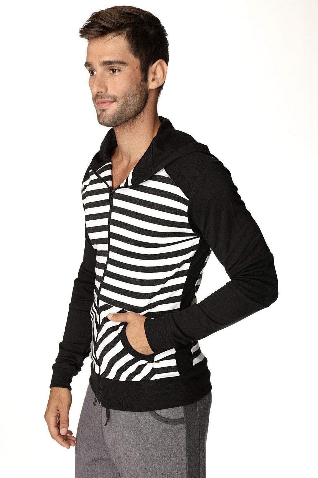 Limited edition form-fit crossover yoga track performance fleece hoodie in black with black and white stripes and solid black sleeves