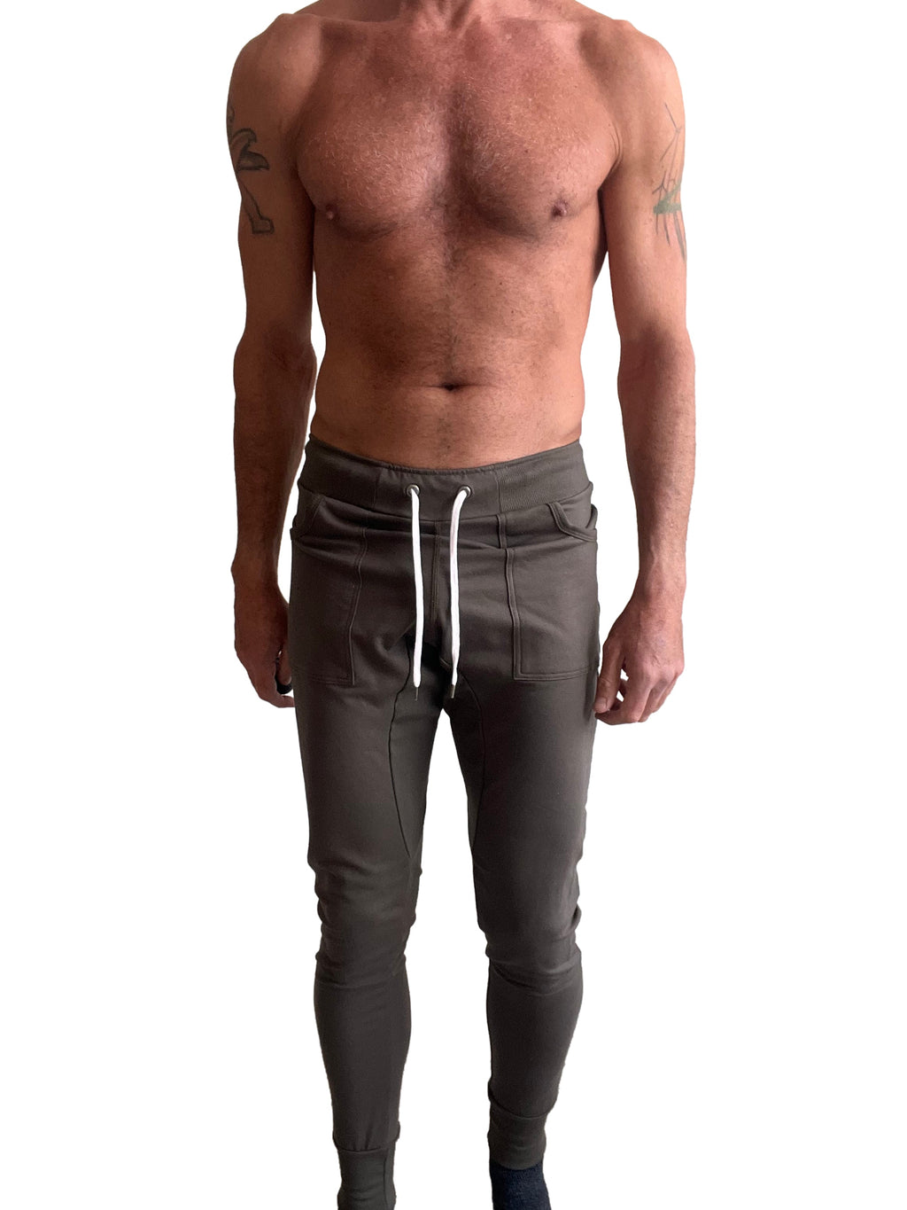 Long cuffed jogger and yoga sweat pants in dark olive with white drawstrings and side pockets for casual or active wear