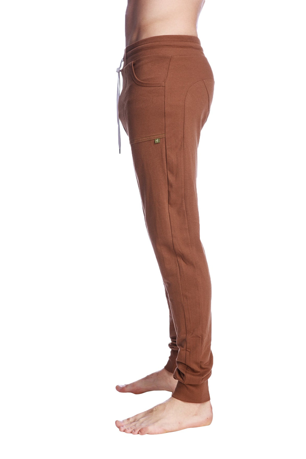 Long cuffed jogger and yoga sweat pants in chocolate brown with drawstring waistband and side pockets in soft fabric