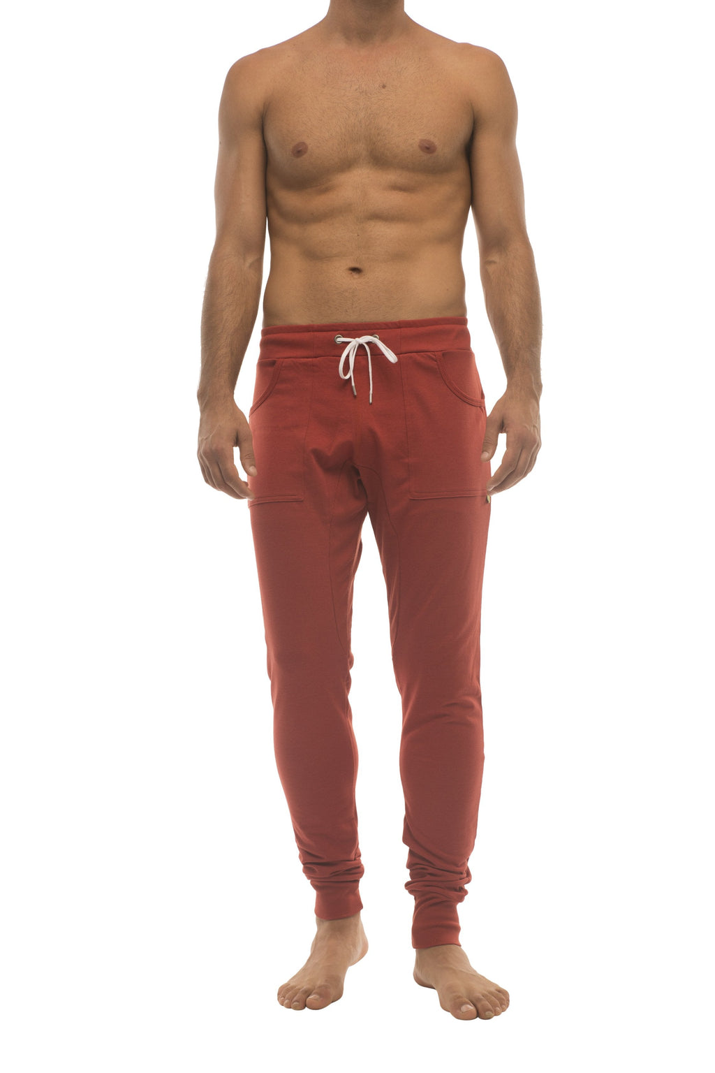 Long cuffed jogger and yoga sweat pants in cinnabar red with white drawstring waistband and side pockets