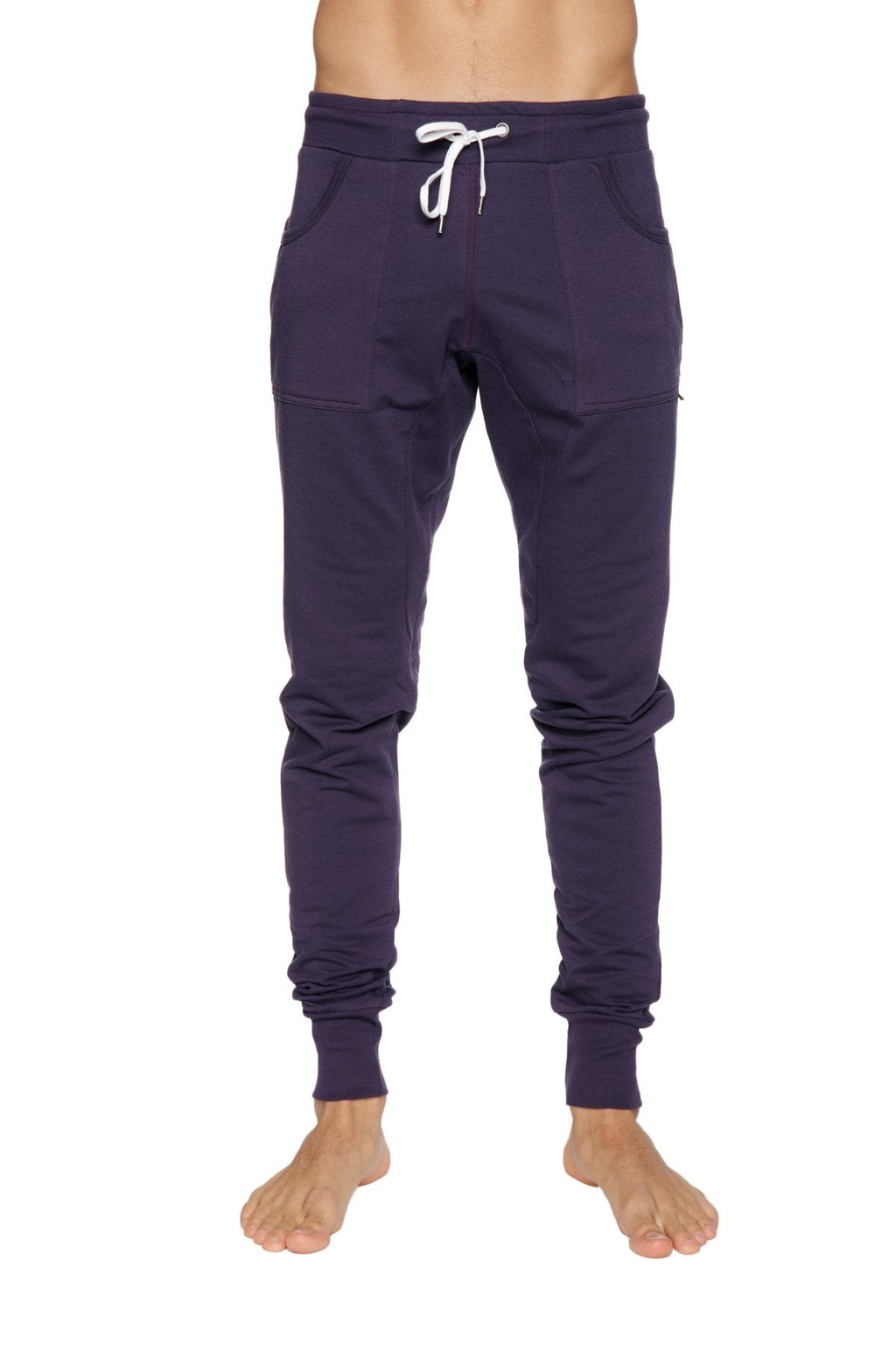 Long cuffed jogger and yoga sweat pants in navy blue with white drawstring waistband and elastic cuffs