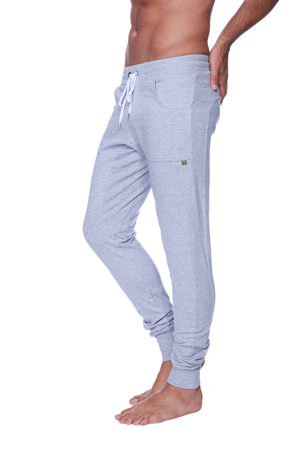 Long cuffed jogger and yoga sweat pants in heather grey with white drawstring and side pockets in light gray fabric