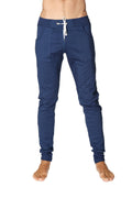 Navy blue long cuffed jogger and yoga sweat pants with white drawstring waistband and elastic cuffs