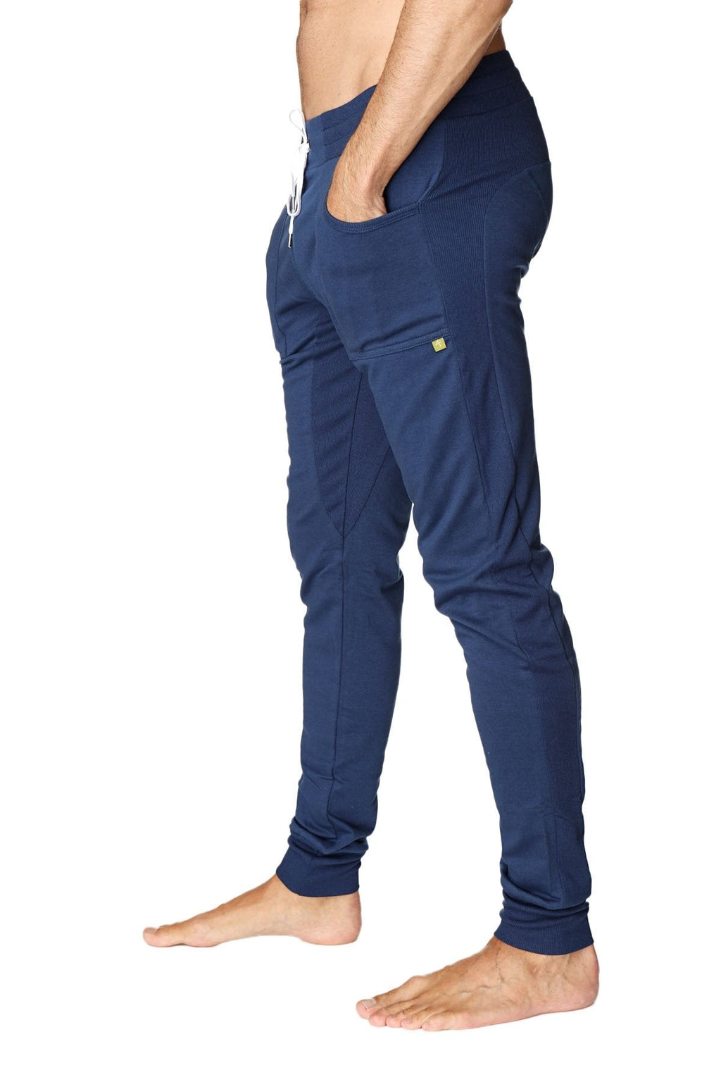 Navy blue long cuffed jogger and yoga sweat pants with white drawstring and lime green logo on thigh pocket