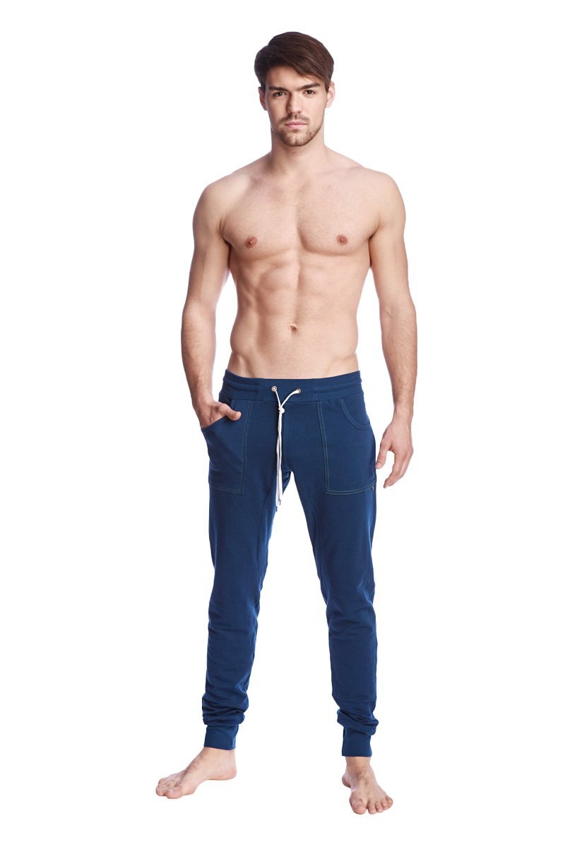 Long cuffed jogger and yoga sweat pants in navy blue with white drawstring and side pockets for comfortable wear