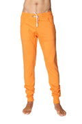 Long cuffed jogger and yoga sweat pants in sun orange with white drawstring and elastic cuffs for comfortable wear