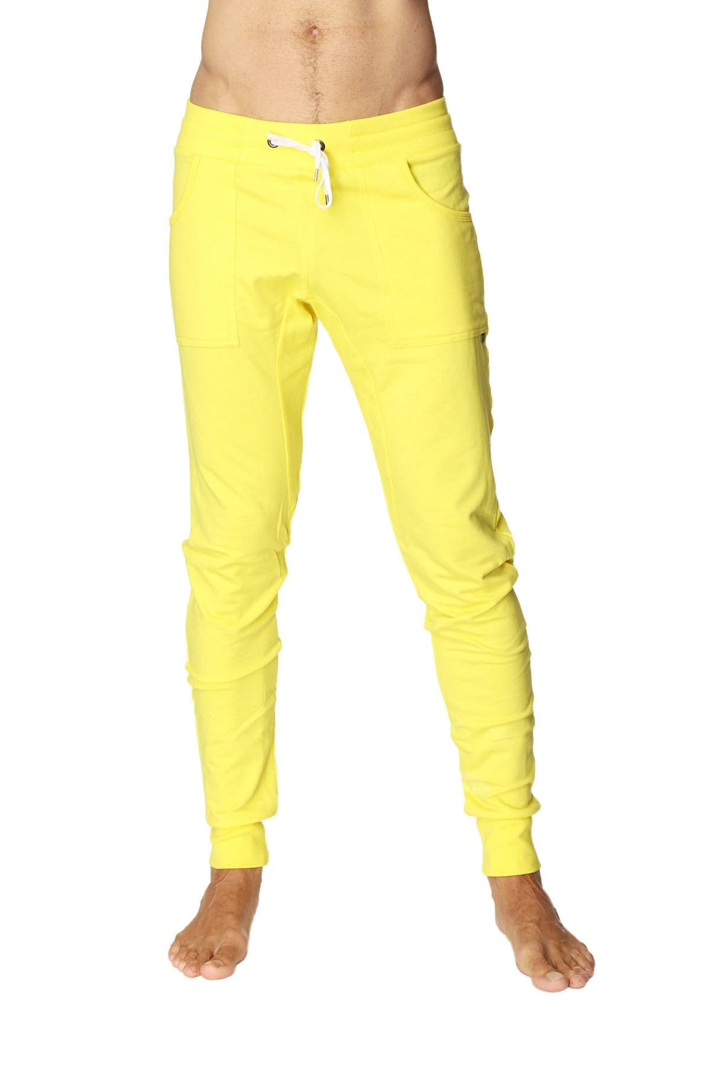 Long cuffed jogger and yoga sweat pants in bright tropic yellow with white drawstring and elastic cuffs